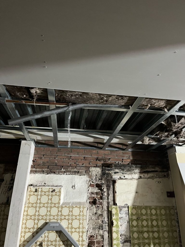 Ceiling boarding and junction details at Blokker in The Hague